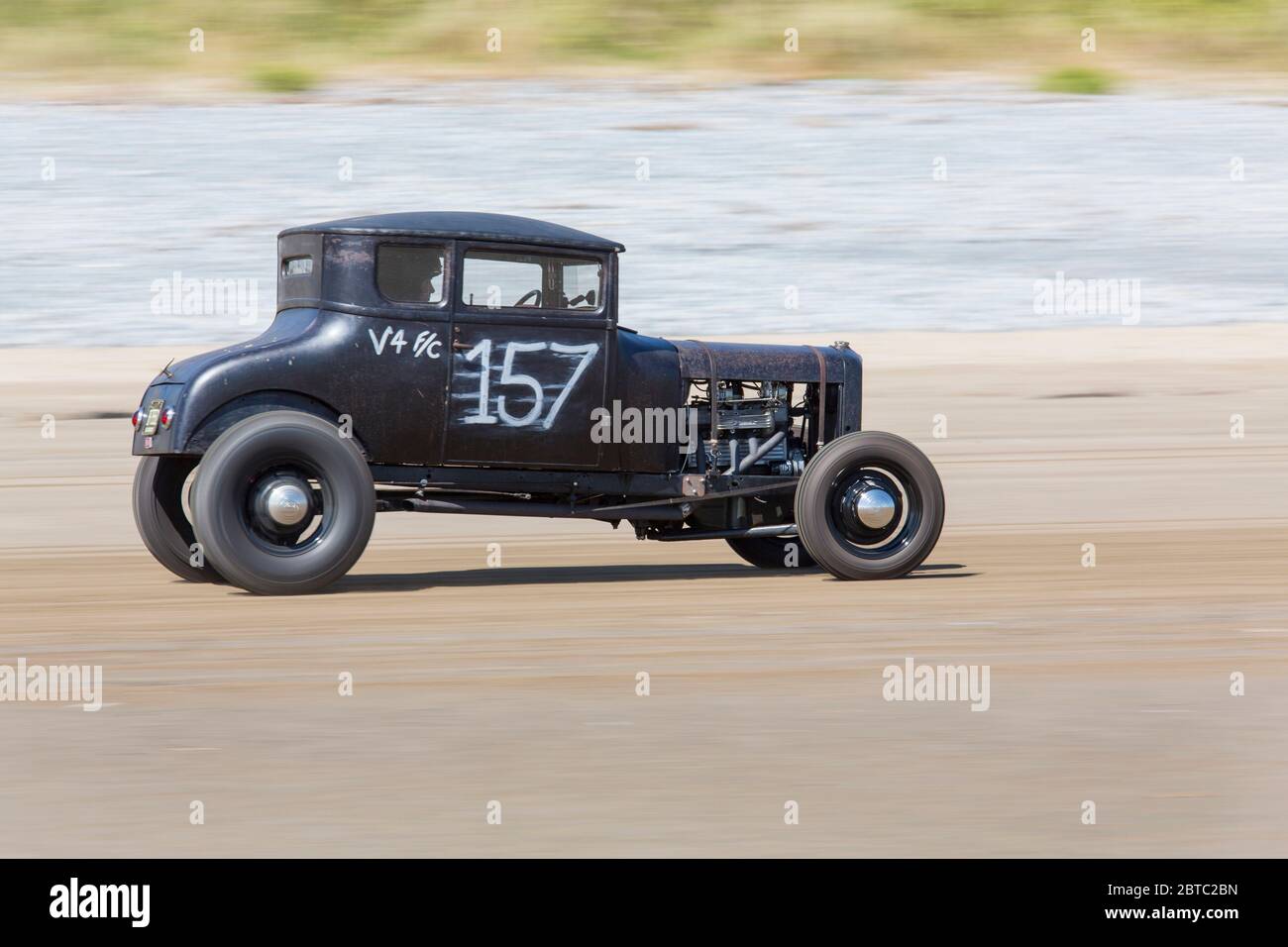Alte amerikanische Autos Hot Rods auf Pendine Sands, Carmarthenshire, Wales UK Stockfoto