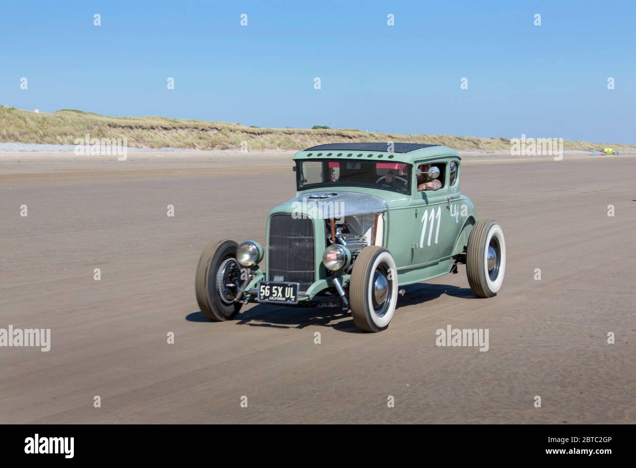 Alte amerikanische Autos Hot Rods auf Pendine Sands, Carmarthenshire, Wales UK Stockfoto