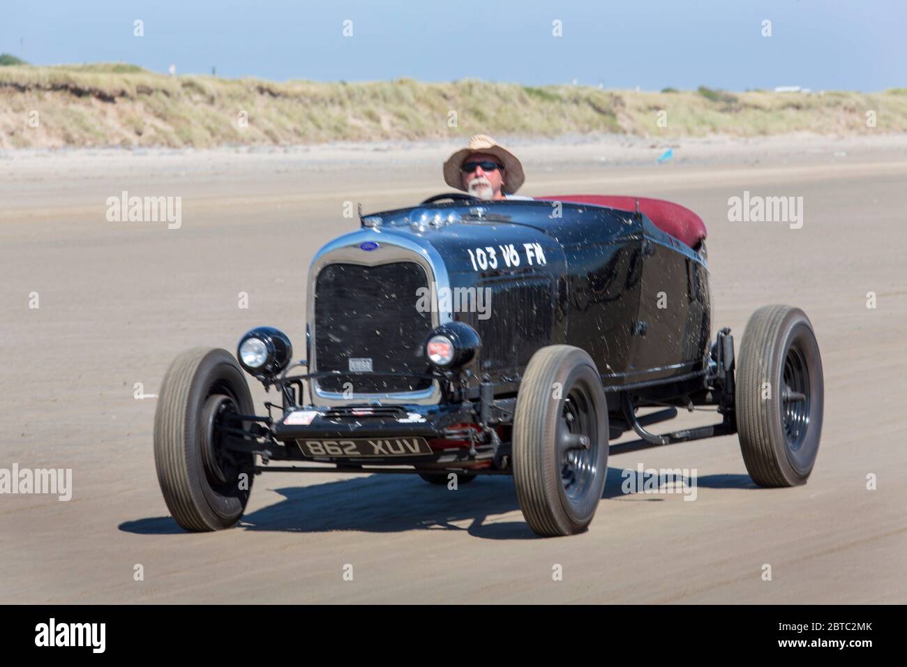 Alte amerikanische Autos Hot Rods auf Pendine Sands, Carmarthenshire, Wales UK Stockfoto