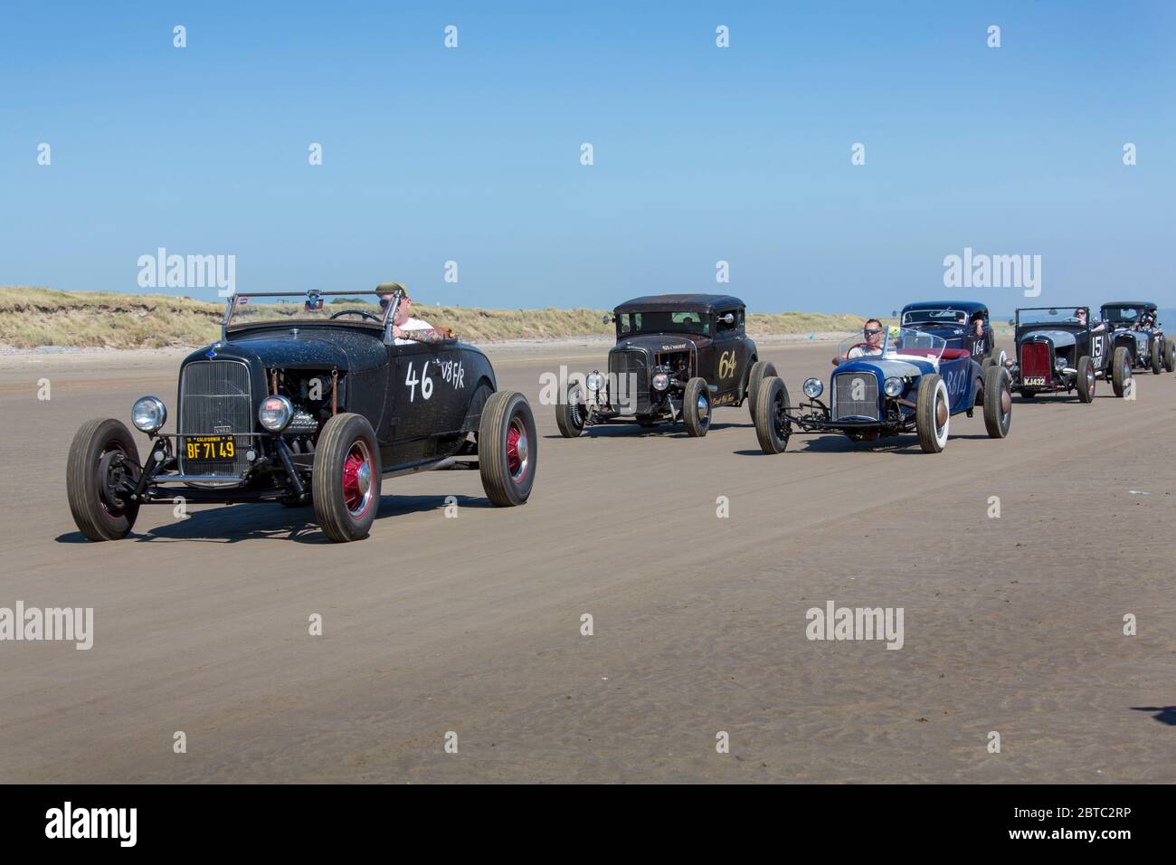 Alte amerikanische Autos Hot Rods auf Pendine Sands, Carmarthenshire, Wales UK Stockfoto