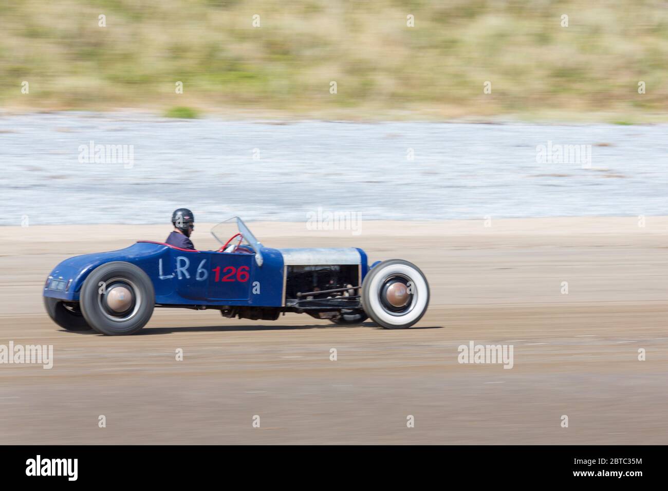 Alte amerikanische Autos Hot Rods auf Pendine Sands, Carmarthenshire, Wales UK Stockfoto