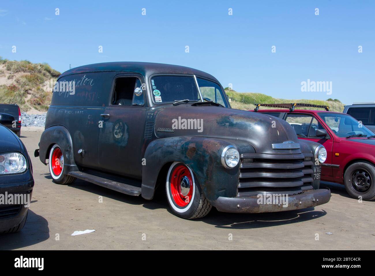 Alte amerikanische Autos Hot Rods auf Pendine Sands, Carmarthenshire, Wales UK Stockfoto