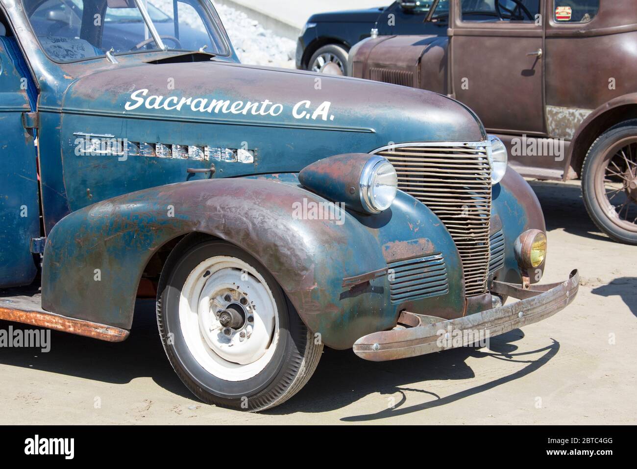 Alte amerikanische Autos Hot Rods auf Pendine Sands, Carmarthenshire, Wales UK Stockfoto