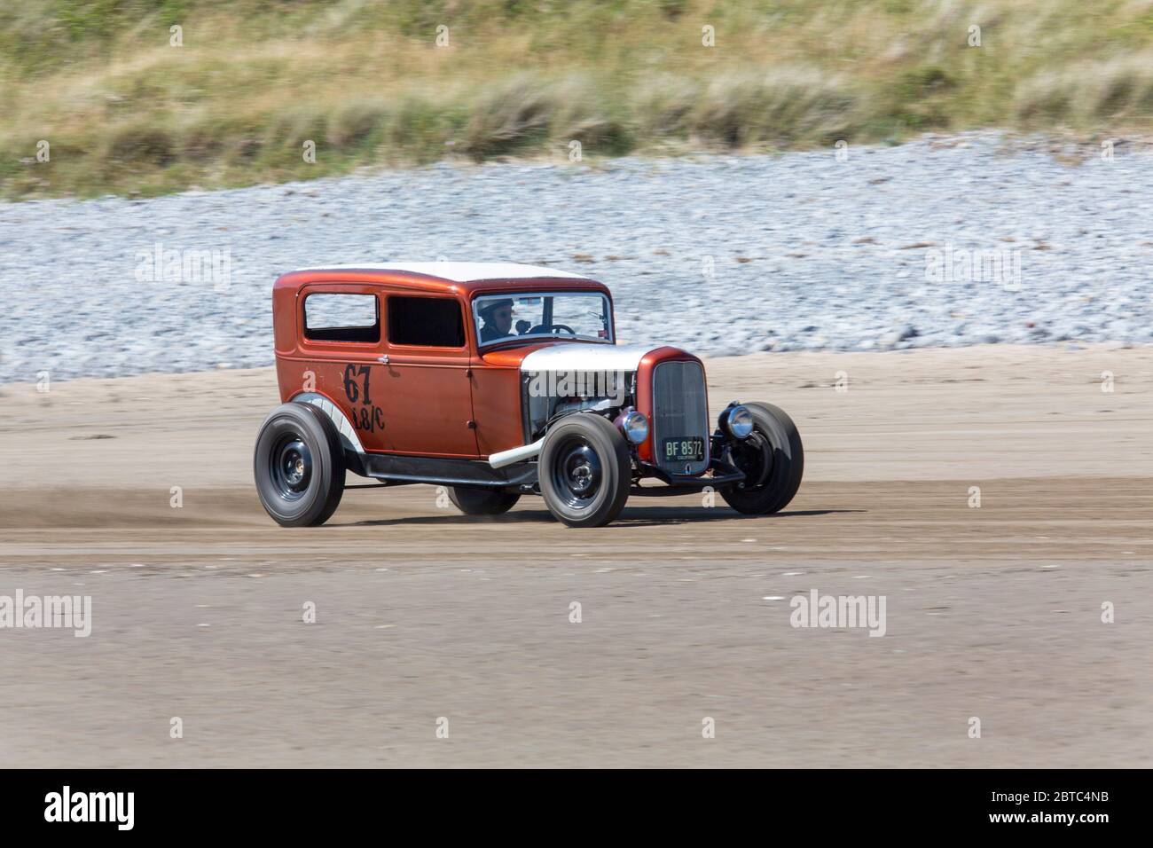 Alte amerikanische Autos Hot Rods auf Pendine Sands, Carmarthenshire, Wales UK Stockfoto