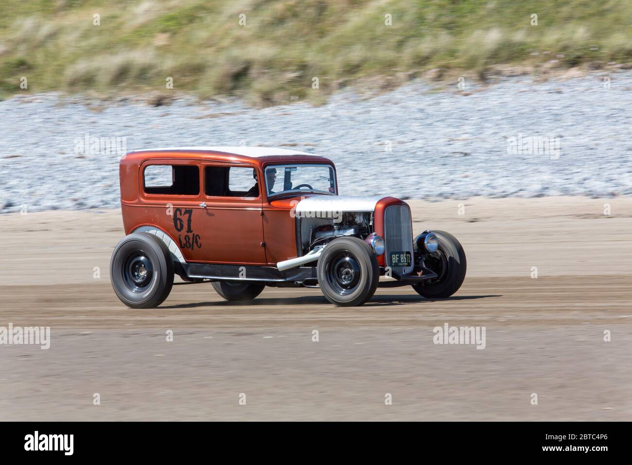 Alte amerikanische Autos Hot Rods auf Pendine Sands, Carmarthenshire, Wales UK Stockfoto