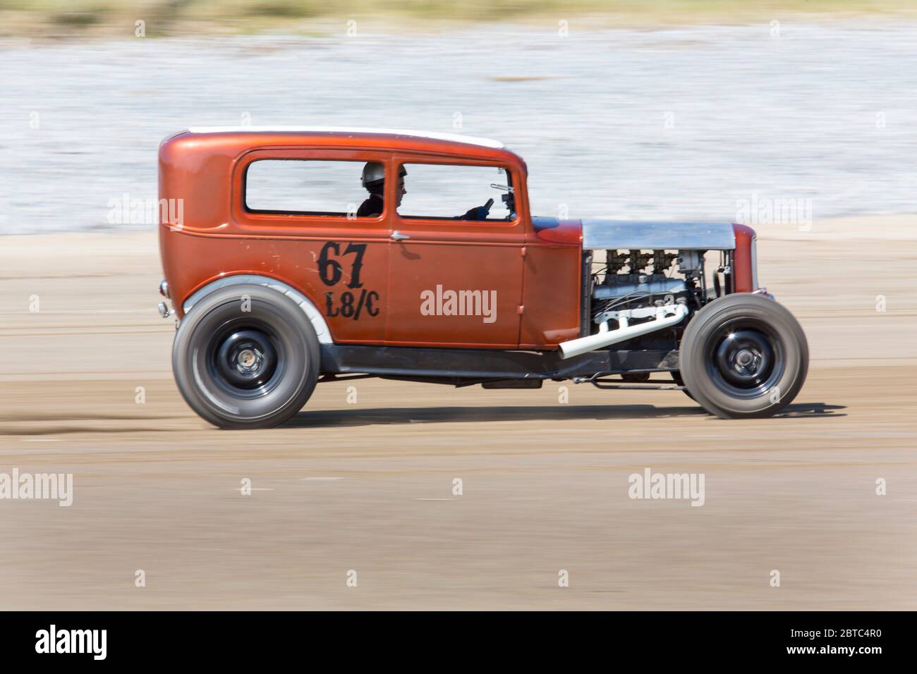 Alte amerikanische Autos Hot Rods auf Pendine Sands, Carmarthenshire, Wales UK Stockfoto
