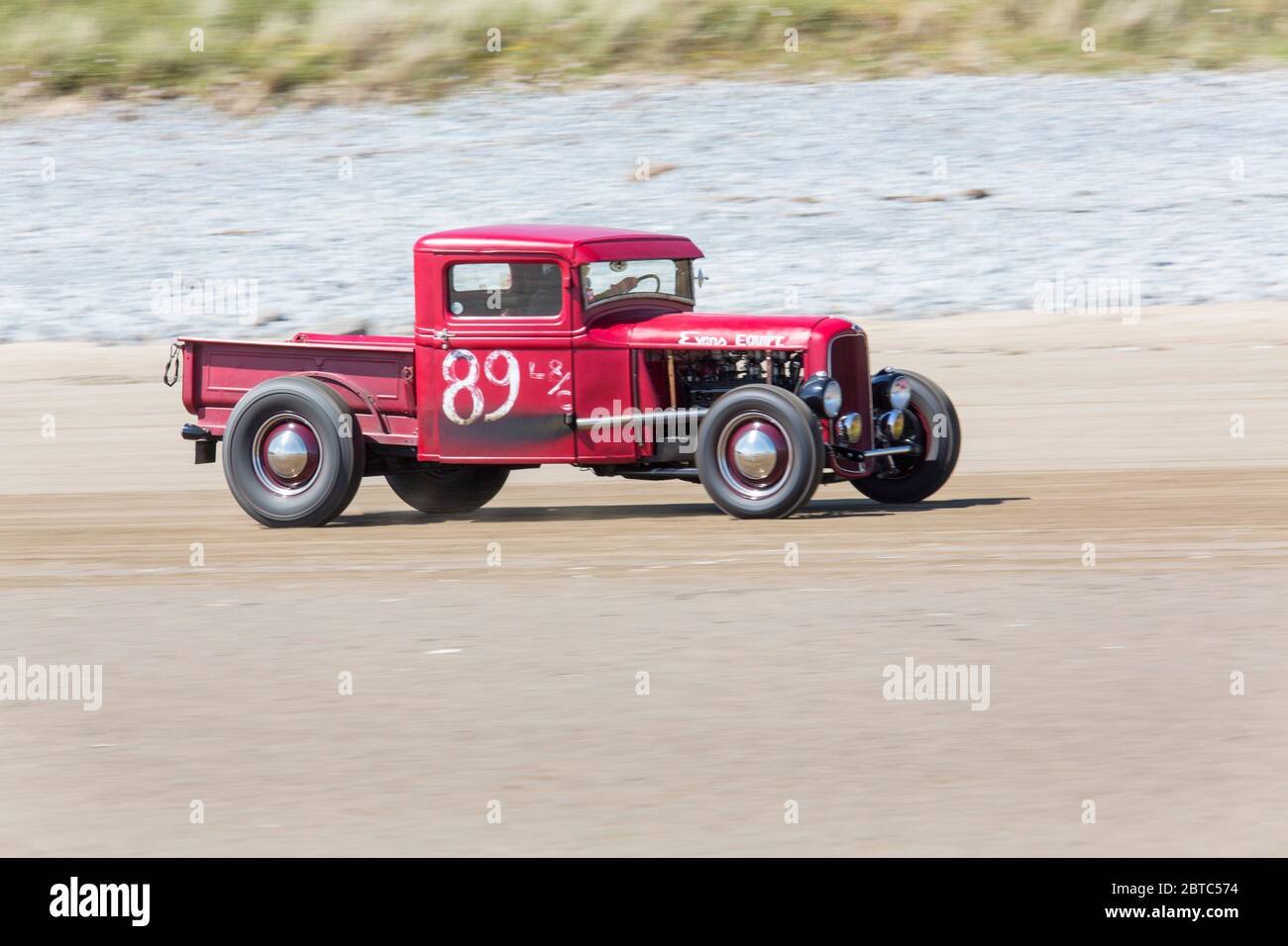 Alte amerikanische Autos Hot Rods auf Pendine Sands, Carmarthenshire, Wales UK Stockfoto