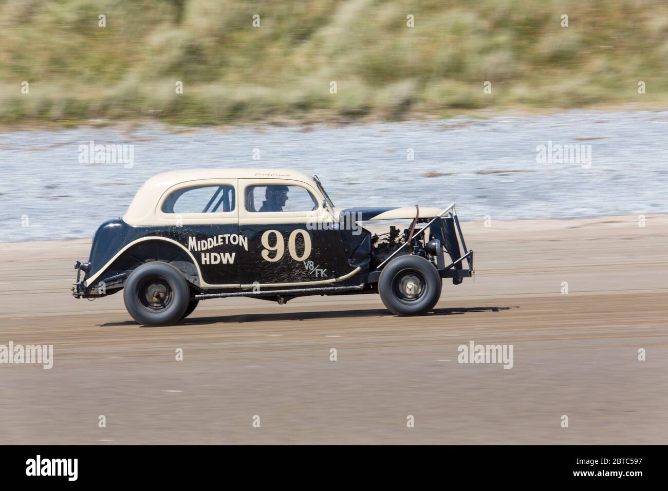 Alte amerikanische Autos Hot Rods auf Pendine Sands, Carmarthenshire, Wales UK Stockfoto
