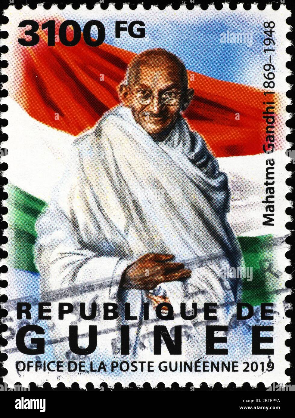 Mahatma Gandhi und indische Flagge auf Briefmarke Stockfoto