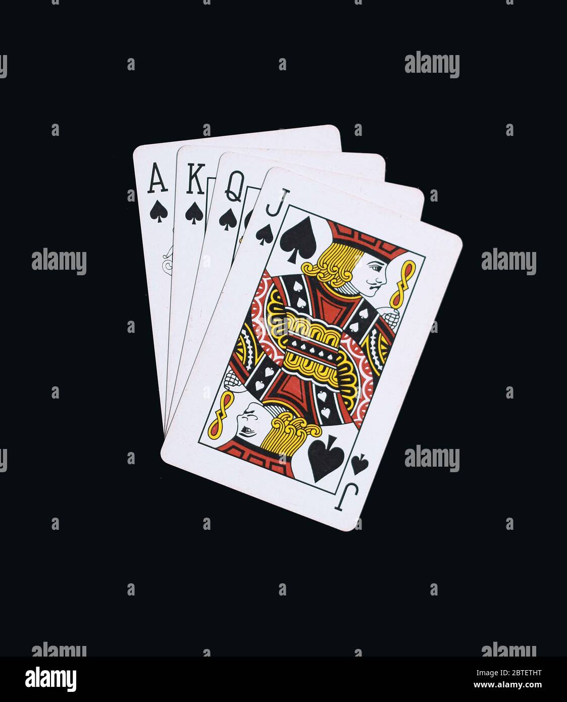 Poker Pik von J Q K A Spielkarten isoliert auf schwarz Stockfoto