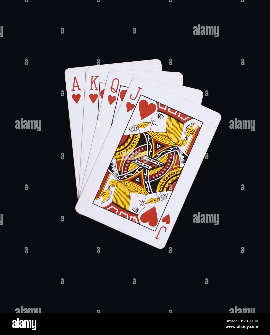Poker Herzen von J Q K A Spielkarten isoliert auf schwarz Stockfoto