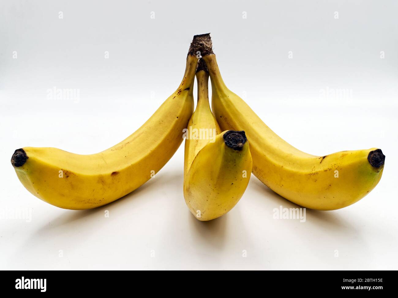 Drei Bananen isoliert auf weißem Hintergrund Stockfoto