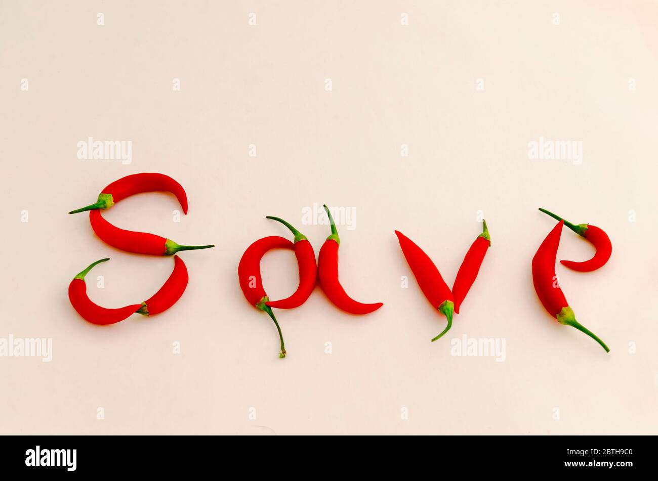 Schild oder Symbol Speichern, aus der Frucht von frischen Chili roten Pfeffer mit einem grünen Stiel, Sofia, Bulgarien Stockfoto