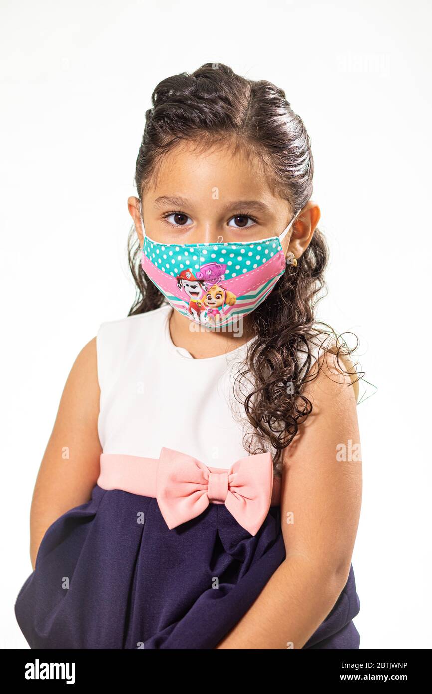 Coronavirus Maske auf Kind Stockfoto