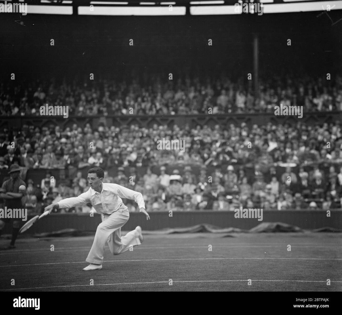 Rasentennis in Wimbledon. Jacques Brugnon im Spiel . 26 Juni 1929 Stockfoto