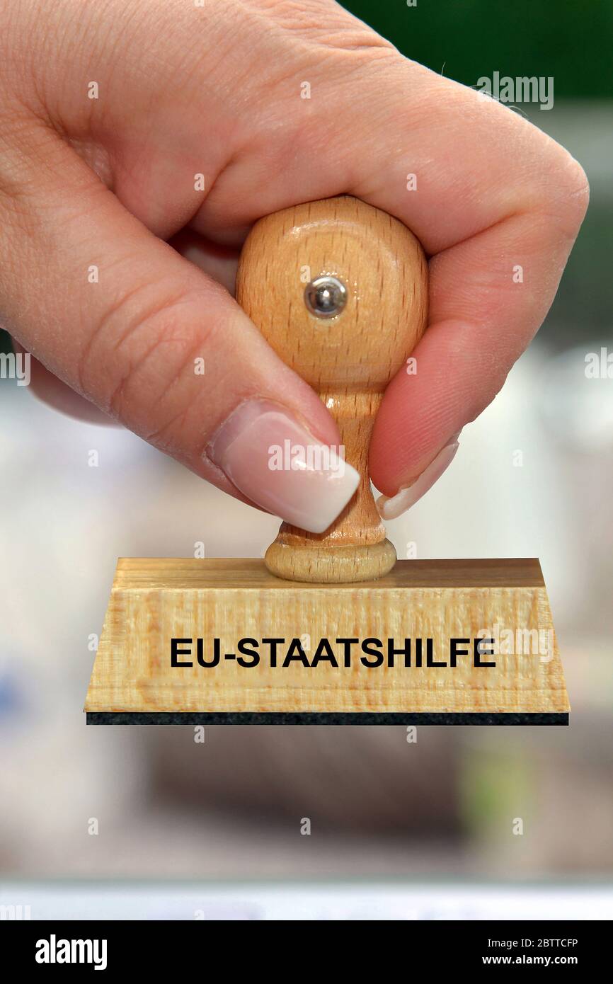 Hand mit Stempel, Frauenhand, Aufschrift: EU-Staatenhilfe, Stockfoto