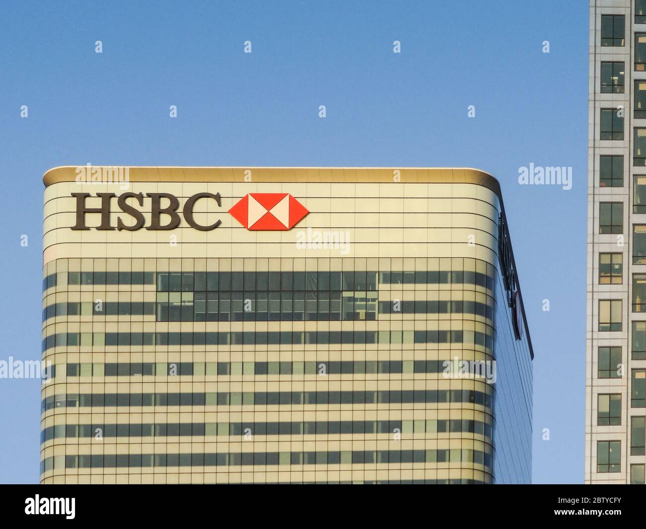 Das Gebäude des HSBC-Hauptquartiers (entworfen von Sir Norman Foster) in Canary Wharf, London, Großbritannien Stockfoto