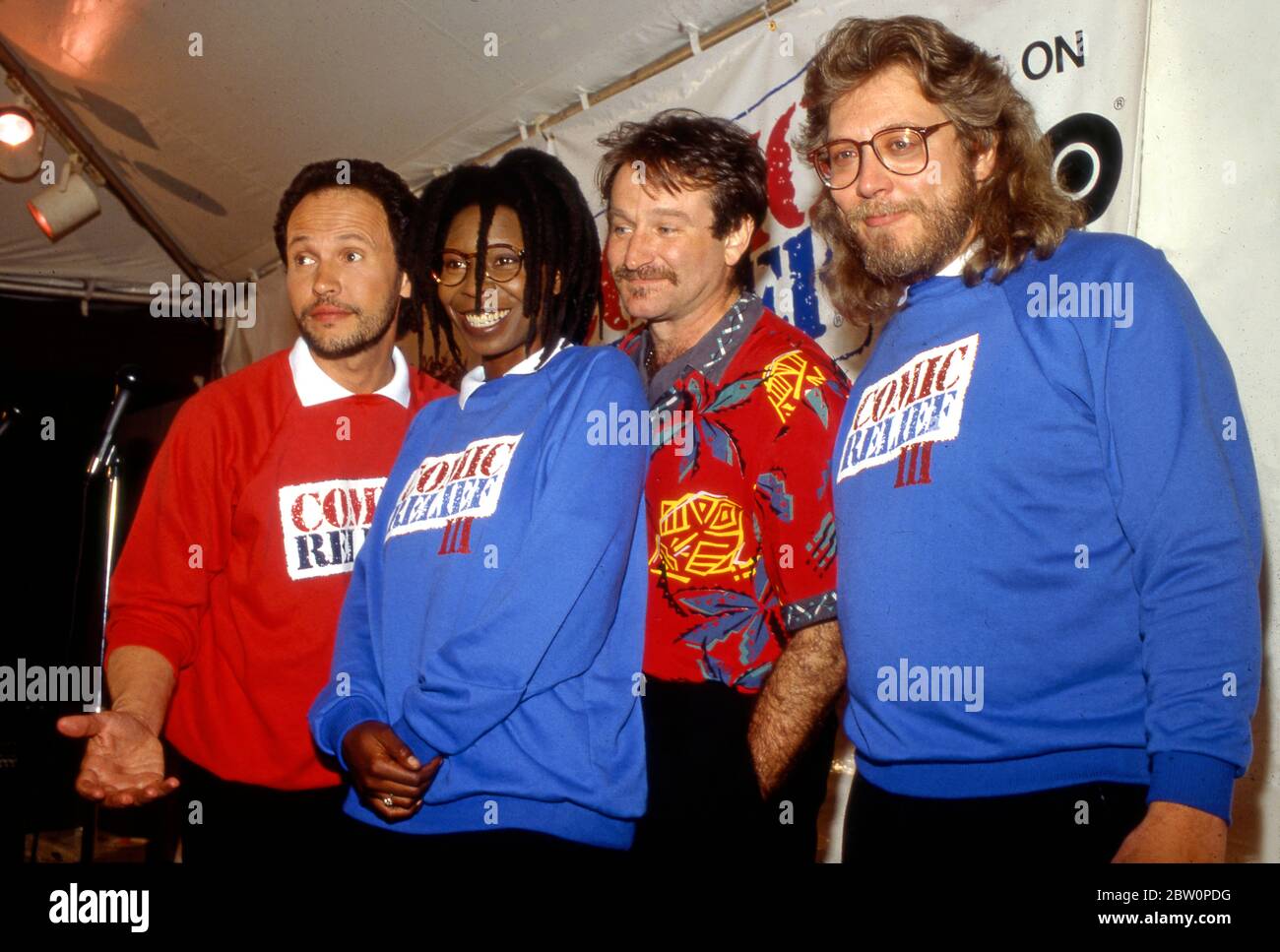Pressekonferenz zu Comic Relief mit Billy Crystal, Whoopi Goldberg, Robin Williams und Produzent Bob Zmuda (von links nach rechts). Stockfoto