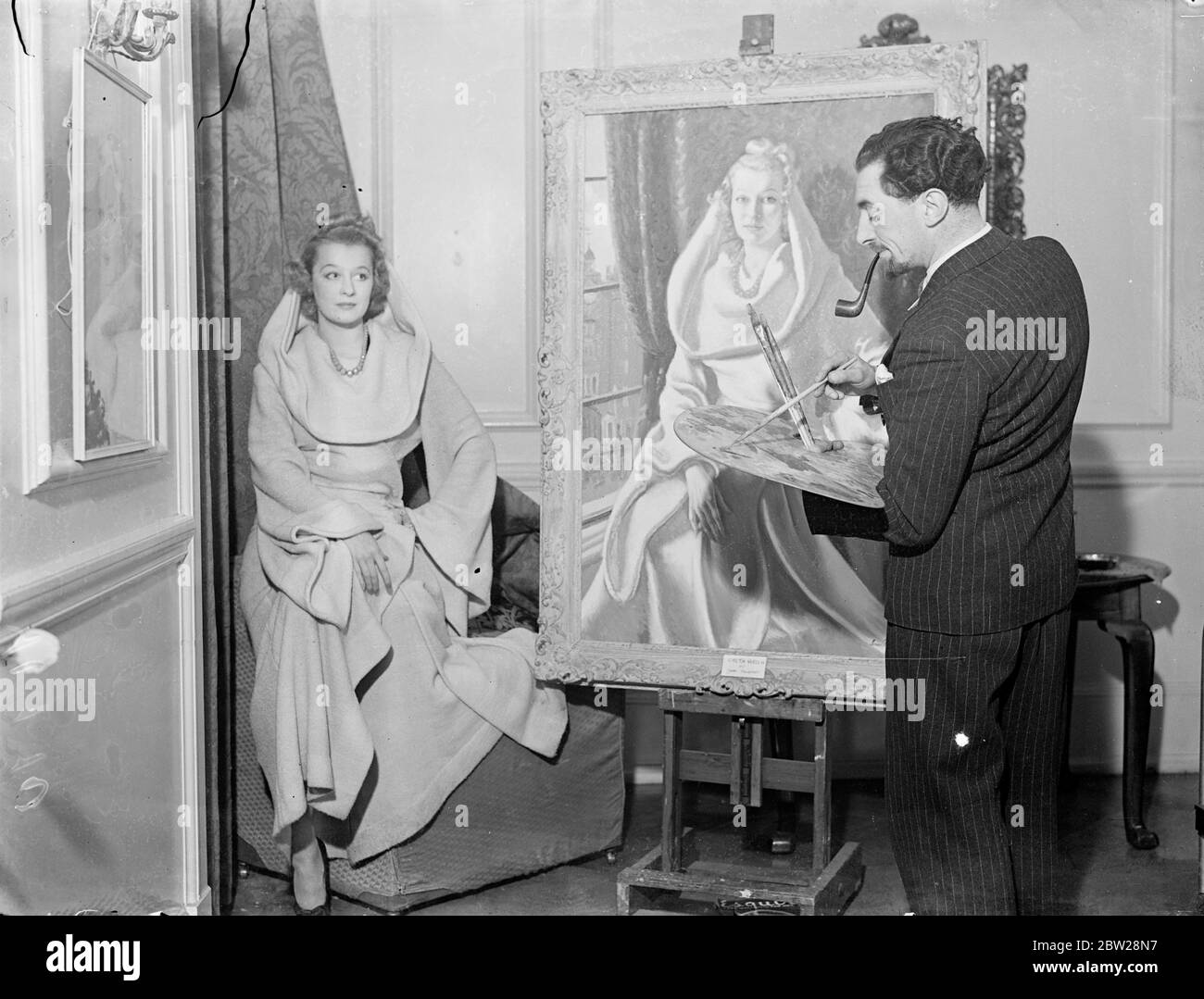 Norwegische Schauspielerin sitzt für Porträt in ihrer eigenen Wohnung. Die norwegische Schauspielerin, die in mehreren britischen Filmen zu sehen war, lässt sich in ihrer Londoner Wohnung mit Blick auf den St. James's Park ihr Porträt von James Proudfoot malen. 16 Dezember 1937 Stockfoto