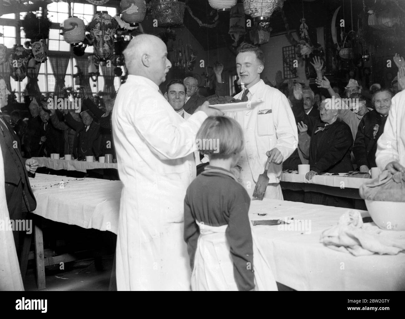 Das Workhouse Weihnachtsessen. 1934 Stockfoto