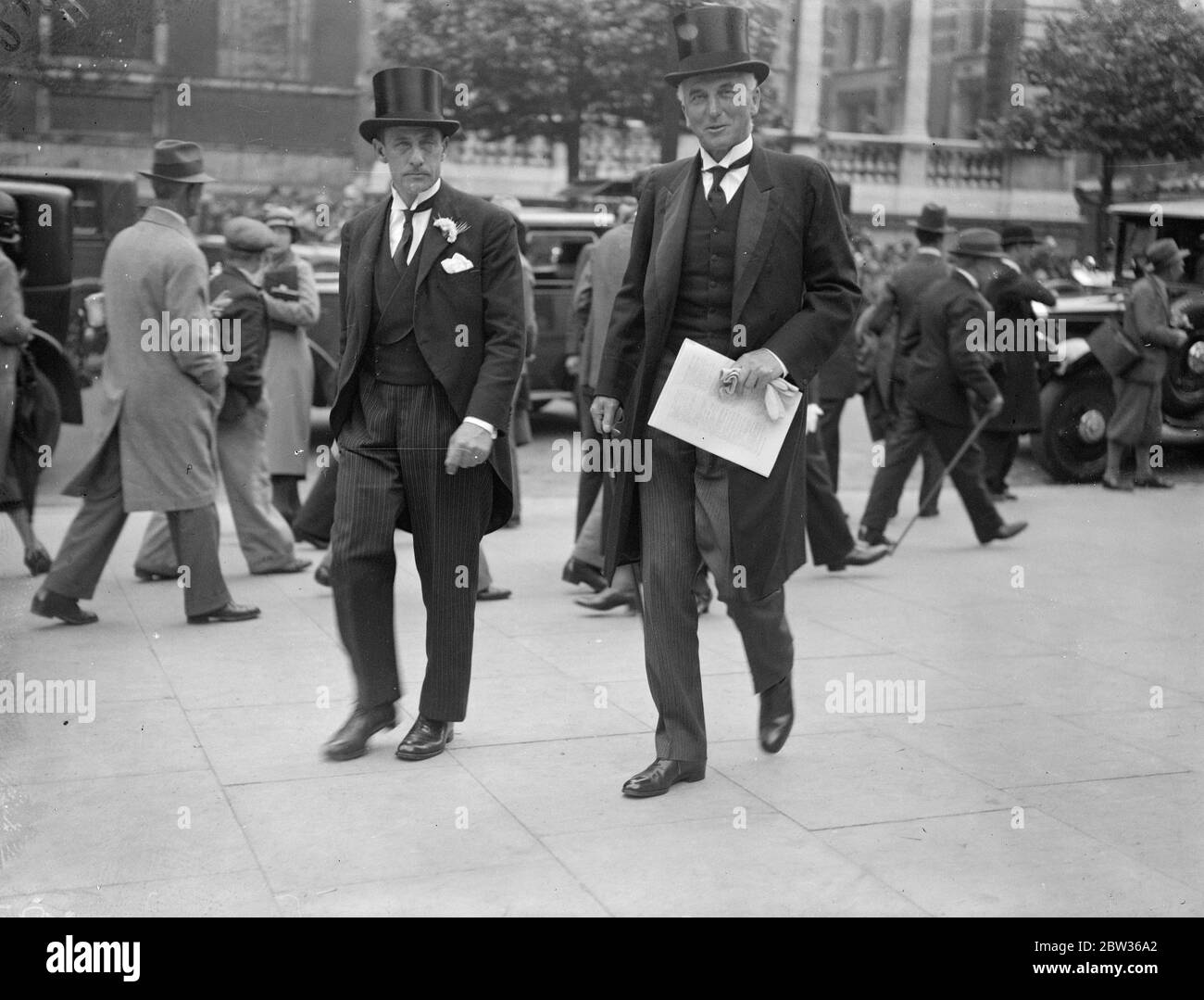 Sir John Simon mit einem anderen in Exhibition Road, London Ankunft an der Wirtschaftskonferenz. Juni 1933 Stockfoto