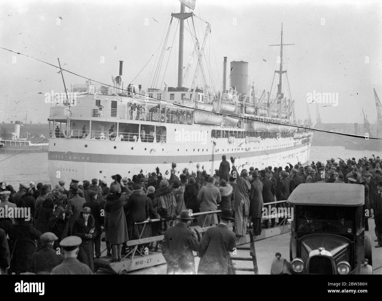 Das neue dänische Ausbildungsschiff "Dänemark", das majestätisch aus Kopenhagen herausfährt, nutzt auf ihrer ersten Reise. Das Schiff ist eines der wenigen, die von ihrem Typ übrig geblieben sind. 11 Mai 1934 Stockfoto