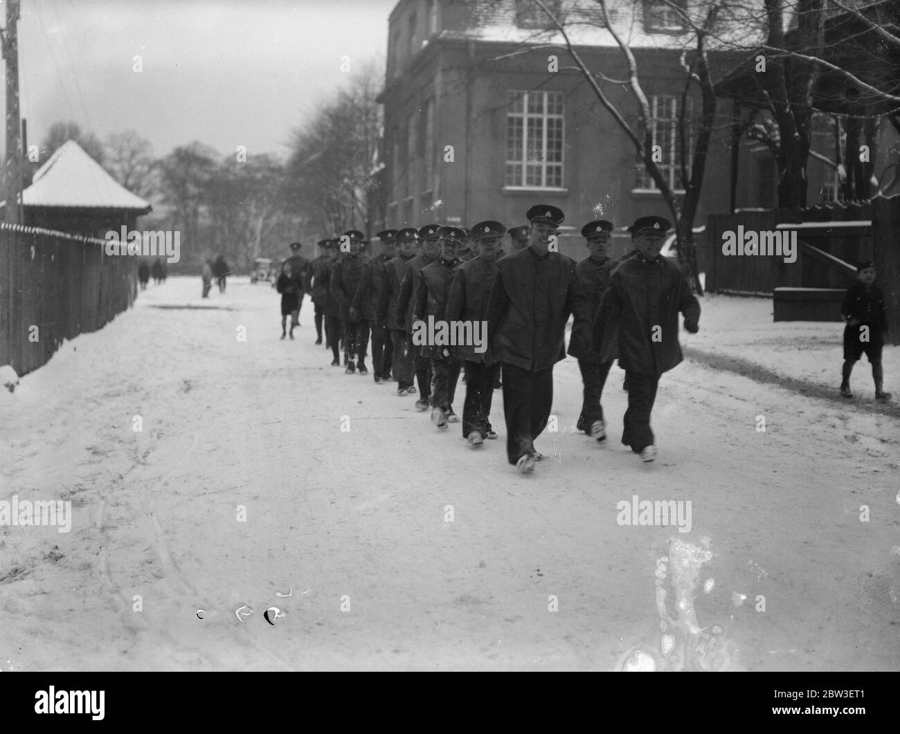 Britische Soldaten marschieren im Schnee während der Saar Volksabstimmung. 13. Januar 1935 Stockfoto