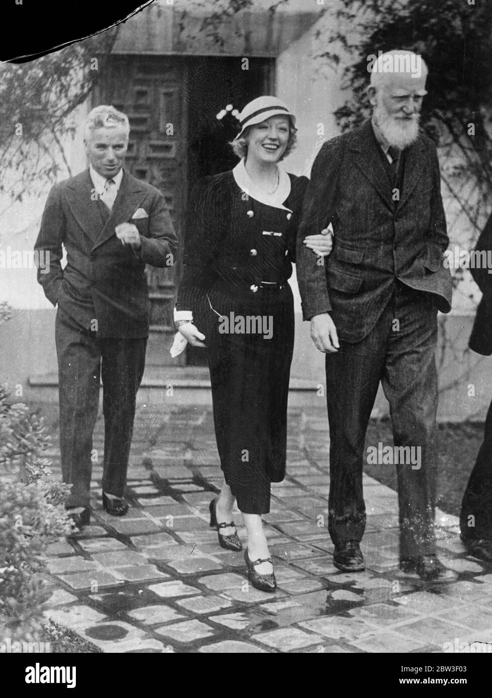 Charles Chaplin , jetzt verlobt Paulette Goddard , Mittagessen mit Herrn George Bernard Show 12 Dezember 1935 Stockfoto
