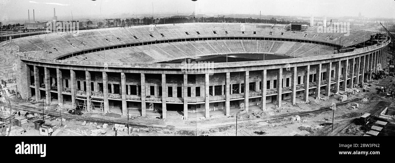 Wo olympische Athleten konkurrieren. Ein allgemeiner Blick auf das große Stadion in der Nähe von Berlin, wo die olympischen Spiele in diesem Sommer stattfinden. Die Bauarbeiten sind nun fast abgeschlossen. 19 März 1936 Stockfoto