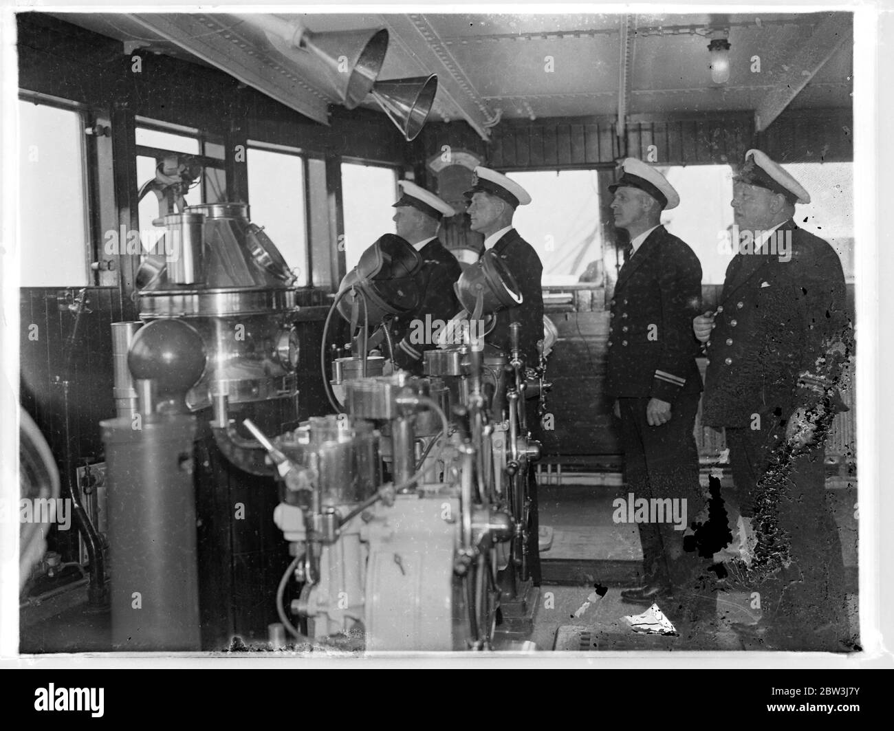 Offiziere auf der Liner-Brücke von Queen Mary : P . C . Davis , Senior 2. Offizier A . C . J - Ansen , 3. Offizier J . G . Watts , Senior 3. Offizier G . L . Dunbar , Junior First Officer Stockfoto