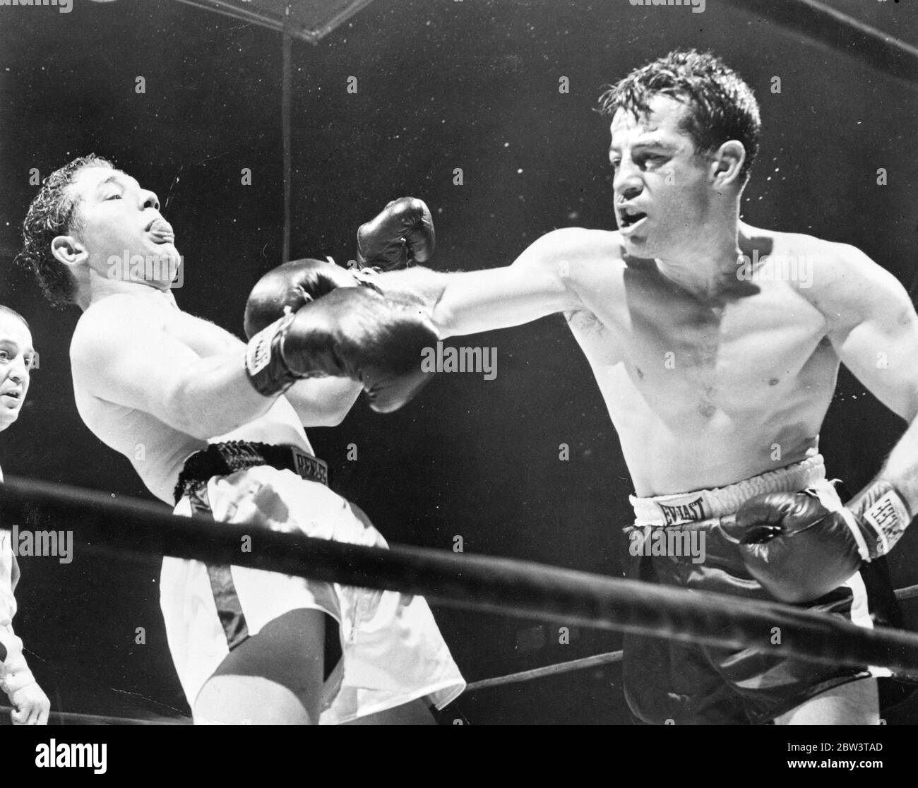 Rocky Graziano kämpft gegen Tony Janiro im Madison Square Garden, New York City, New York . 10. Januar 1936 Stockfoto