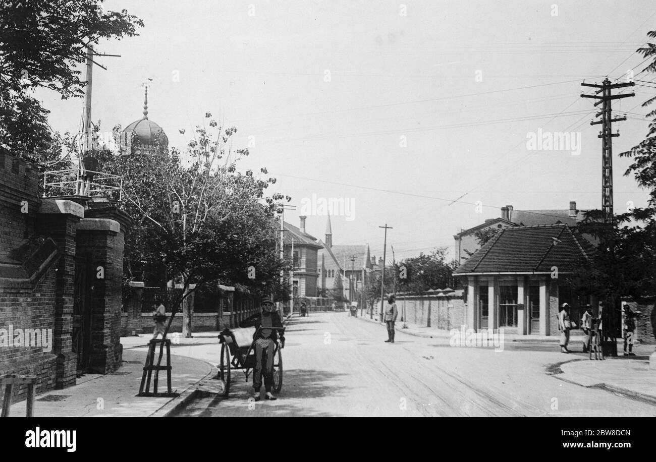 Tianjin Eine Straße in der britischen Konzession von Tien Tsin. Mai 1928 Stockfoto