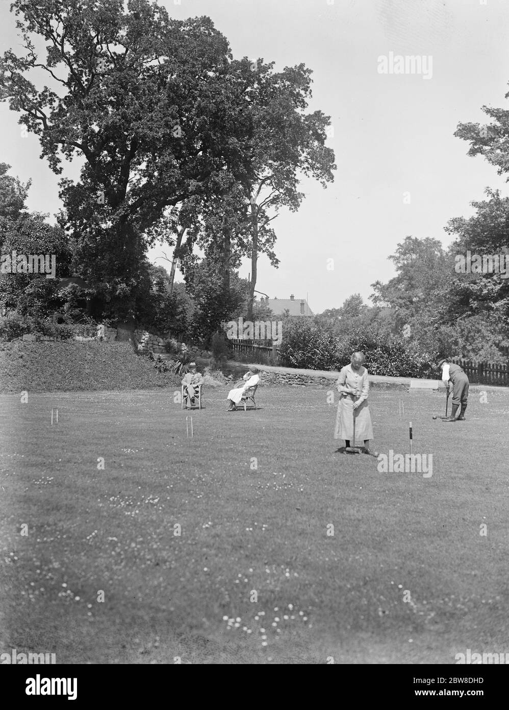 Krocket spielen auf dem Rasen bei Oakhill . 1928 Stockfoto
