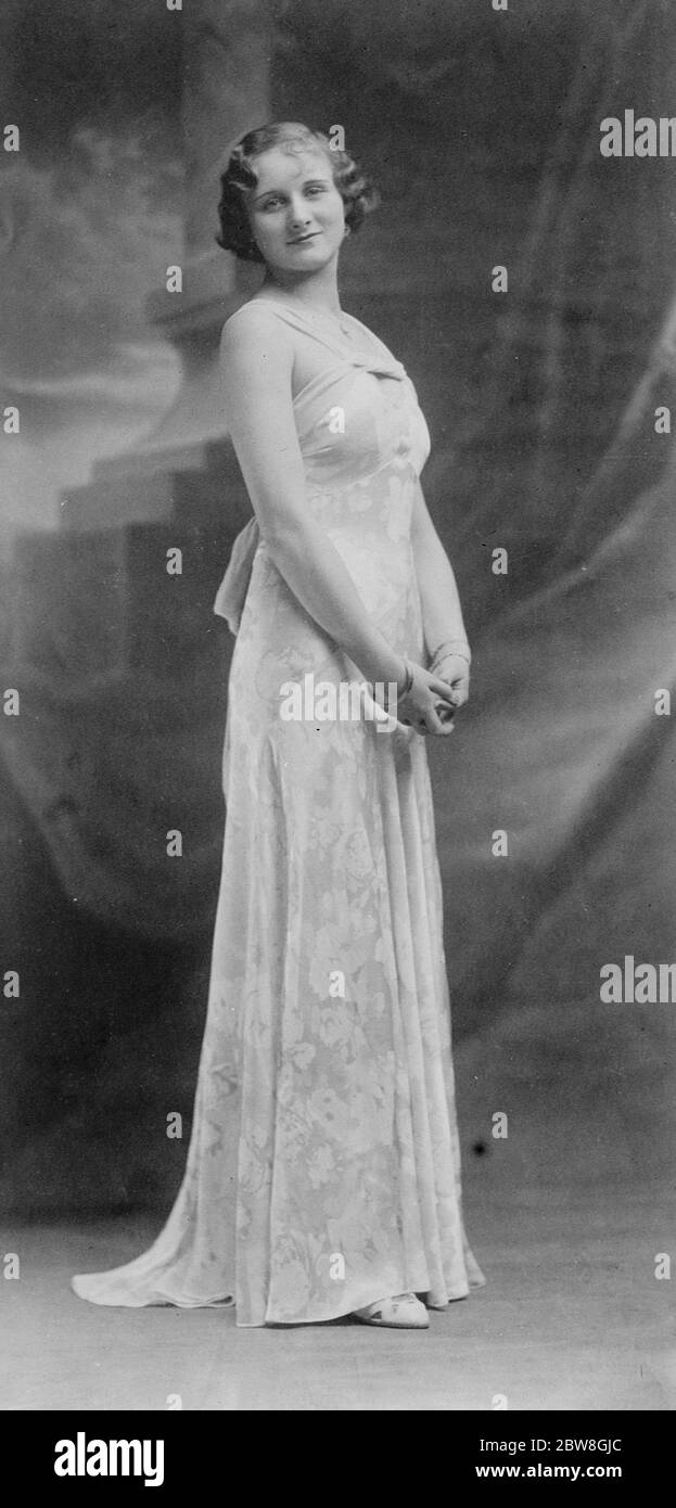 Miss Angela ward , das Mädchen in West Kensington, das einen Sonderpreis für Charme beim internationalen Schönheitswettbewerb in Madrid erhielt, hat, Laut Mundo Grafico akzeptiert ein lukratives Angebot von einem Madrid produzierenden Unternehmen in einem Film jetzt im Laufe der Produktion erscheinen. 10 Juni 1933 Stockfoto