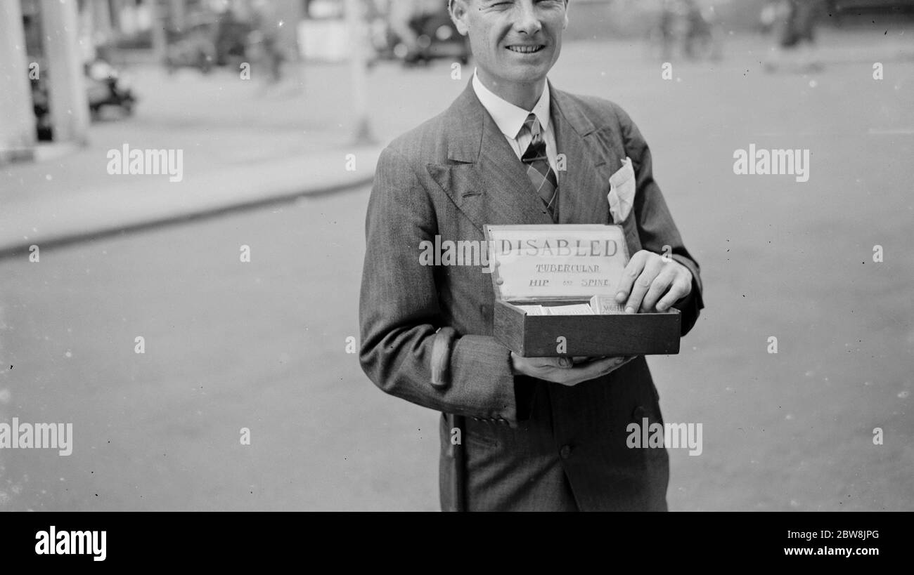 Behinderter Mann von Tuberkulose betroffen , Verkauf von Streichhölzern in Sidcup . 1935 . Stockfoto