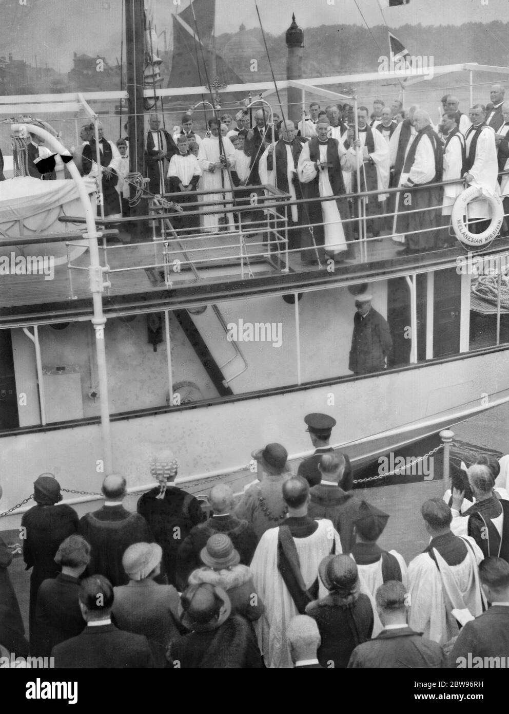 Erzbischof von Canterbury widmet Melanesian Mission Schiff in Themse . Dr. Cosmo lang, der Erzbischof von Canterbury, widmete das Southern Cross VI, die melanesische Mission Schiff, das in Greenwich liegt, bereit, für die Melansian Inseln im Pazifik zu segeln. Der Erzbischof von Canterbury, die Leitung der Einweihung des südlichen Kreuzes VI in Greenwich. 26 Juli 1932 Stockfoto