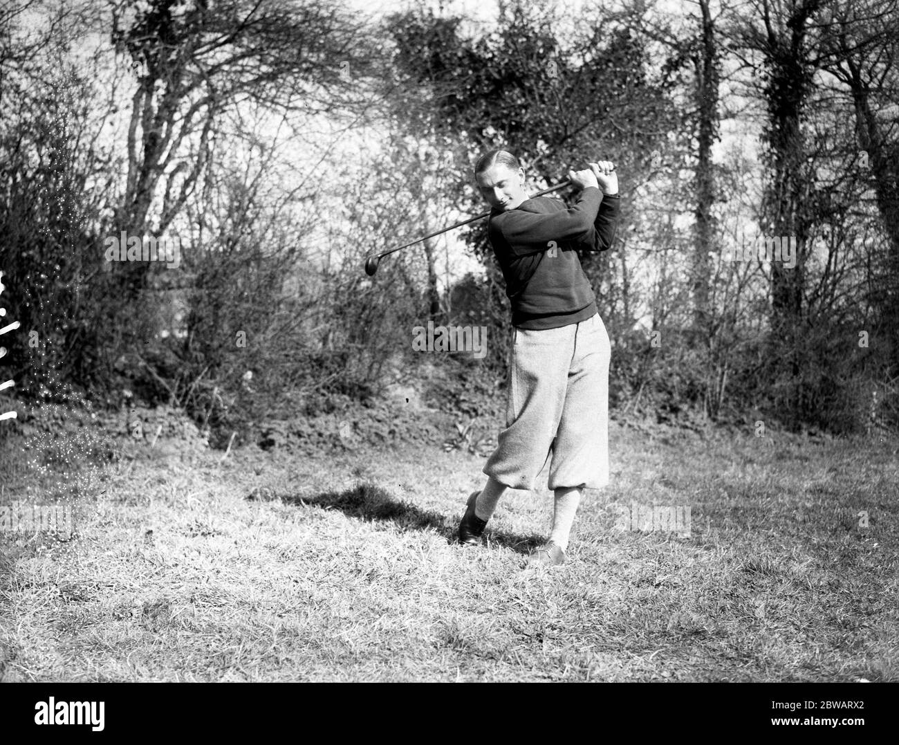 Varsity Golf Spiel in Burnham . N S Mitchell Innes, (Oxford) auf dem Kurs. Stockfoto