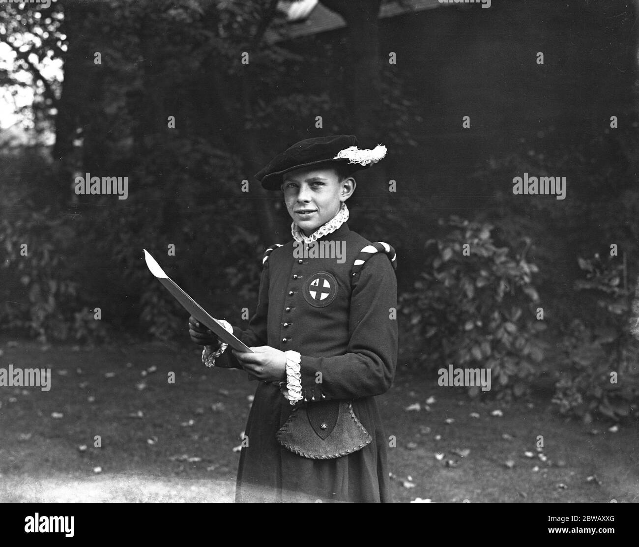 Master Edward Händel, ein direkter Nachfahre des berühmten Musikers, im malerischen Kleid des Lord Mayor 's Boy Players, vor der Spieleroper Saison in den Old Vic und Sadler ' s Wells Theatern. 15. September 1931 Stockfoto