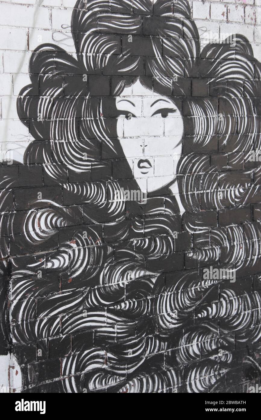 Graffiti Kunst der Frau mit lockigen Permed Frisur Stockfoto