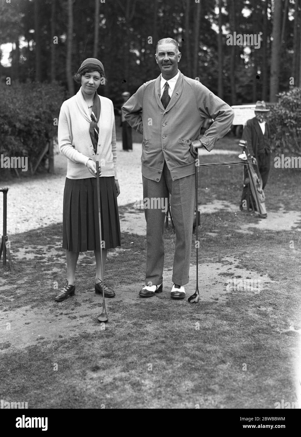 Männer gegen Frauen Golf im neuseeländischen Club, Byfleet Miss Joyce Wethered und Major Le Roy Burnham 1931 Stockfoto