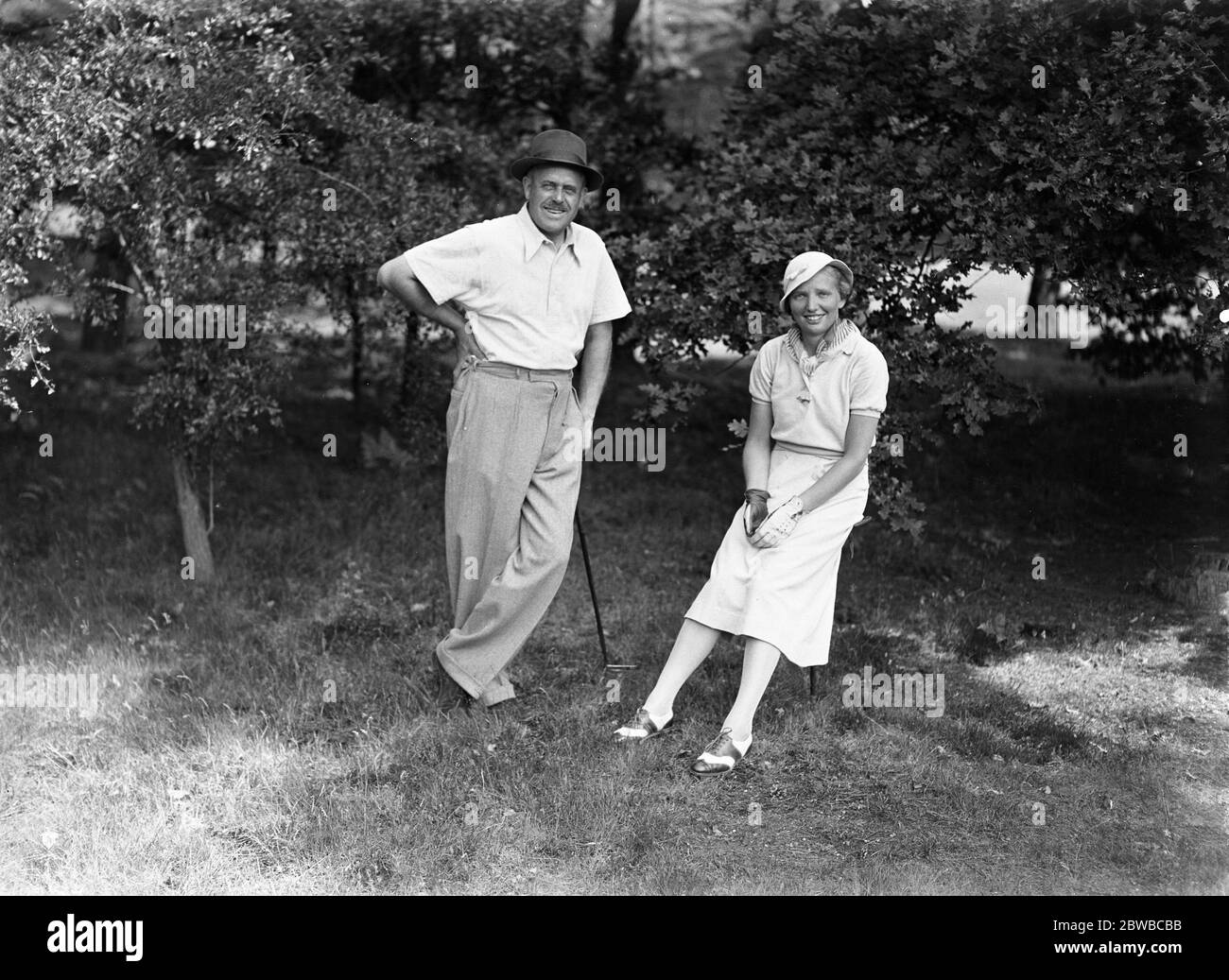 Damen gegen Herren im New Zealand Golf Club, Byfleet. Herr Douglas Fish und Frau Diana Fishwick . 1934 Stockfoto