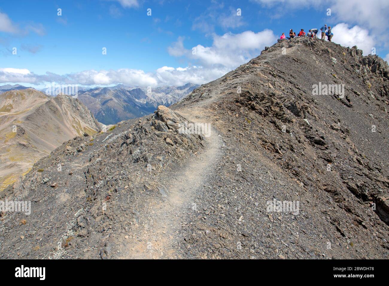 Wanderer auf dem Gipfel des Avalanche Peak im Arthur's Pass National Park Stockfoto