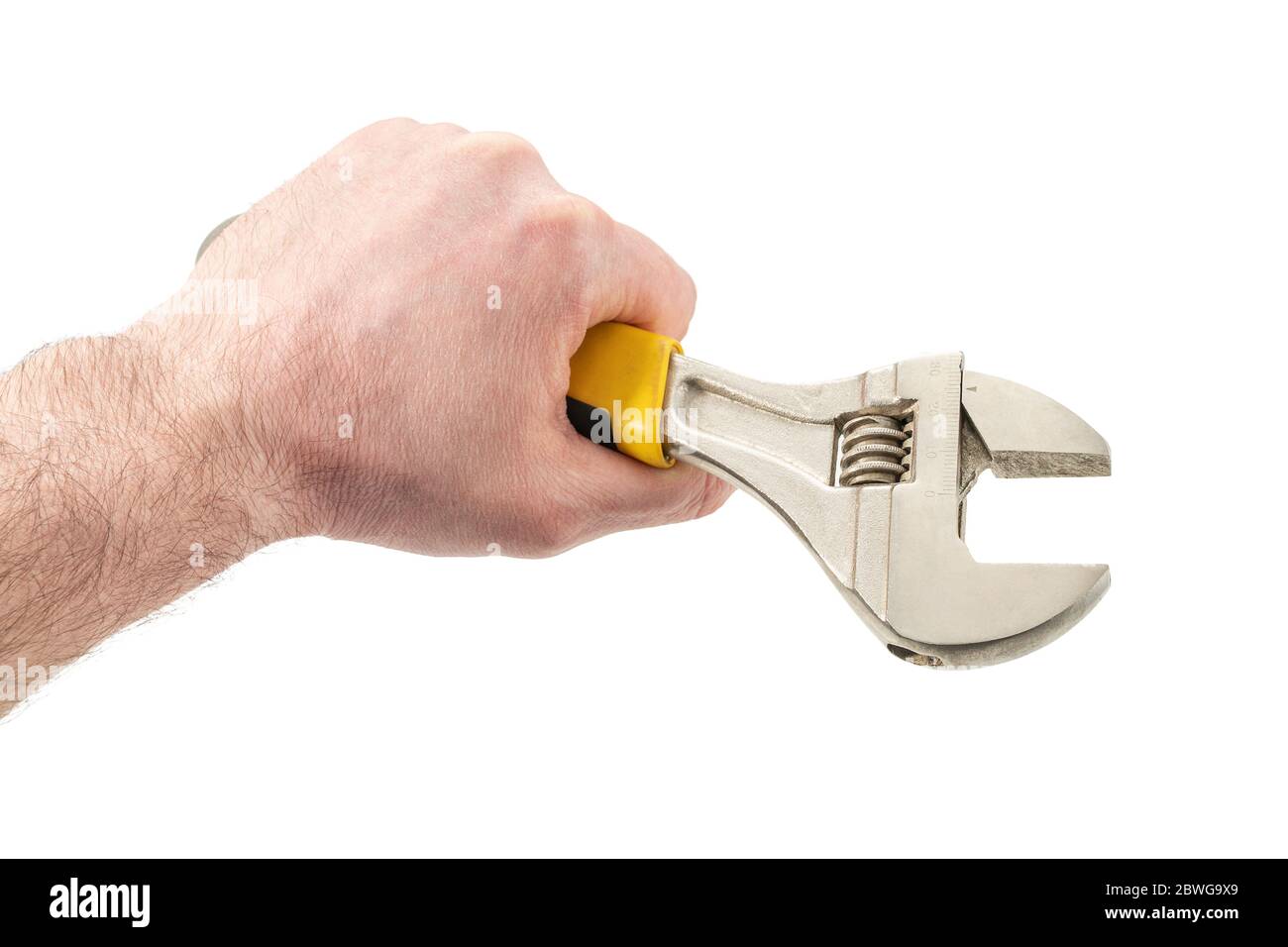 Schraubenschlüssel in einer männlichen Hand Stockfoto