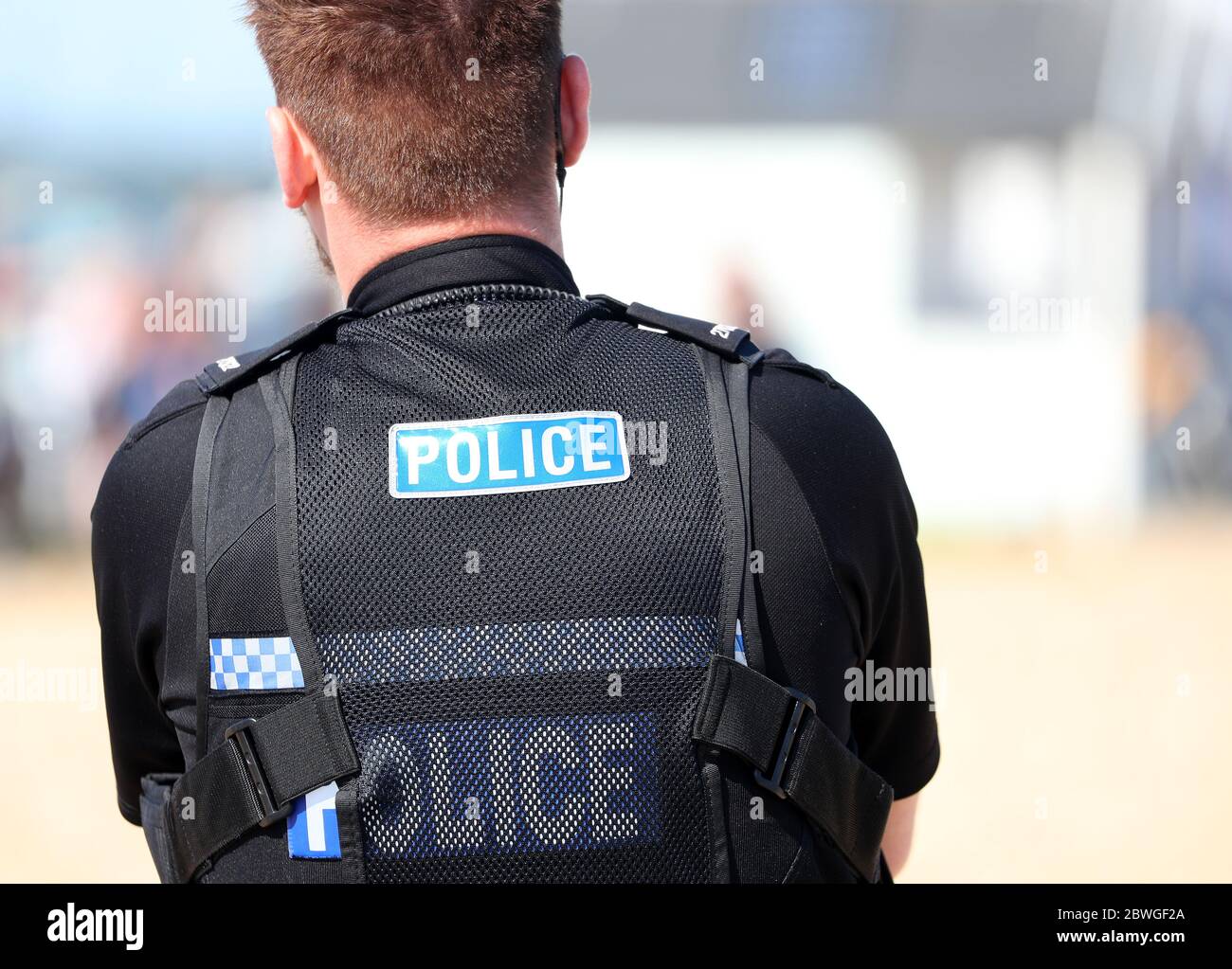 Hampshire Polizist auf Benzin an einem Strand in Großbritannien Stockfoto