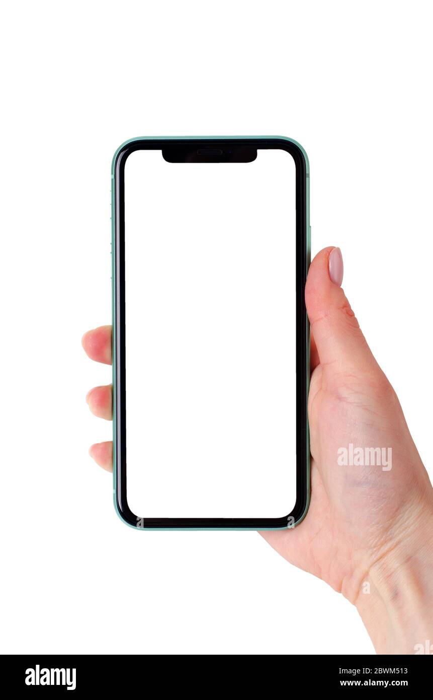 Moskau, Russland - 18. Januar 2020: Grünes Apple iPhone 11 Modell in einer weiblichen Hand isoliert auf weißem Hintergrund. Nahaufnahme eines neuen Smartphones von AP Stockfoto