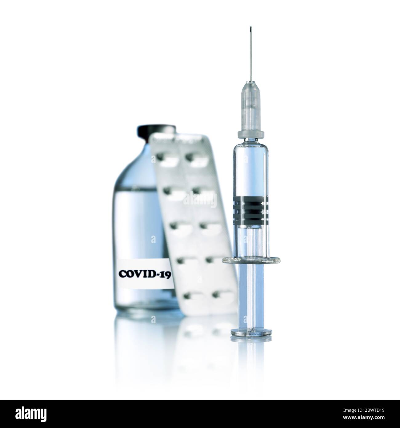 Spritze, Tabletts und Impfstoff Stockfoto