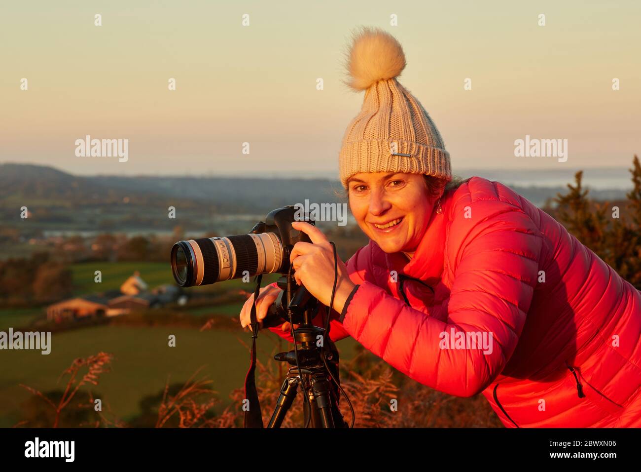 Weibliche Amateurfotograf mit einer Fotografie Lektion Stockfoto