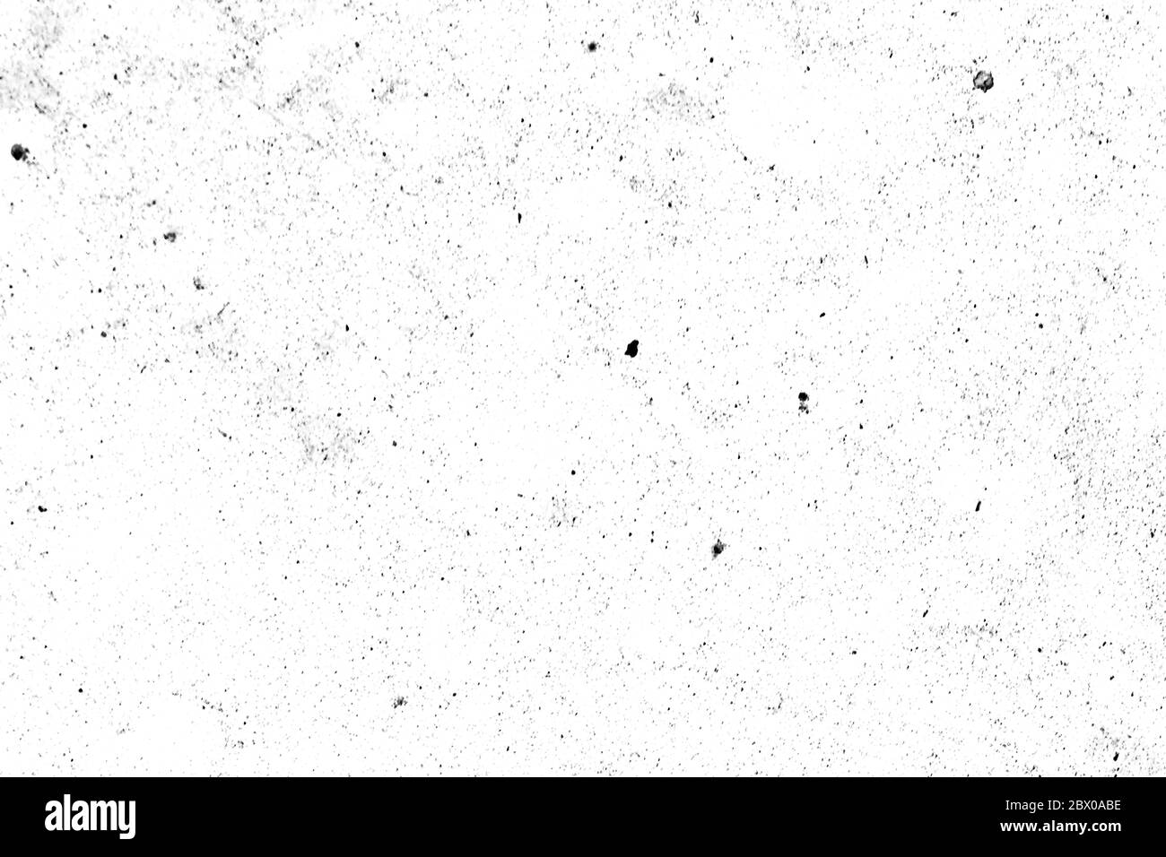 Schwarz-weiß Grunge Hintergrund. Abstrakte monochrome Textur von Rissen, Kratzern, Spänen, Staub Stockfoto