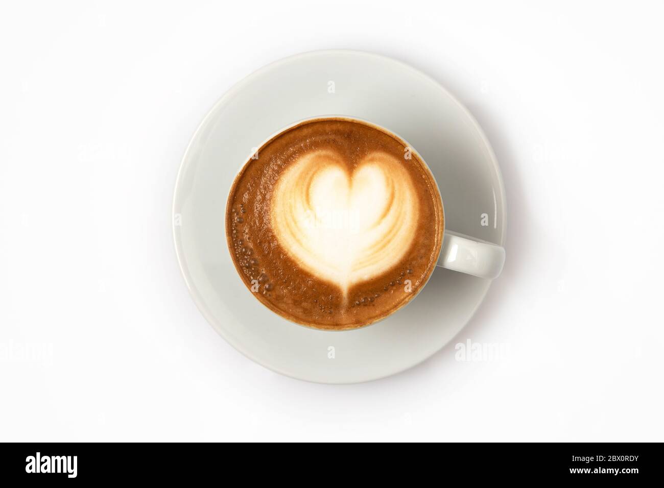 Eine Tasse Kaffee von oben. Herzförmige Latte Art Stockfoto