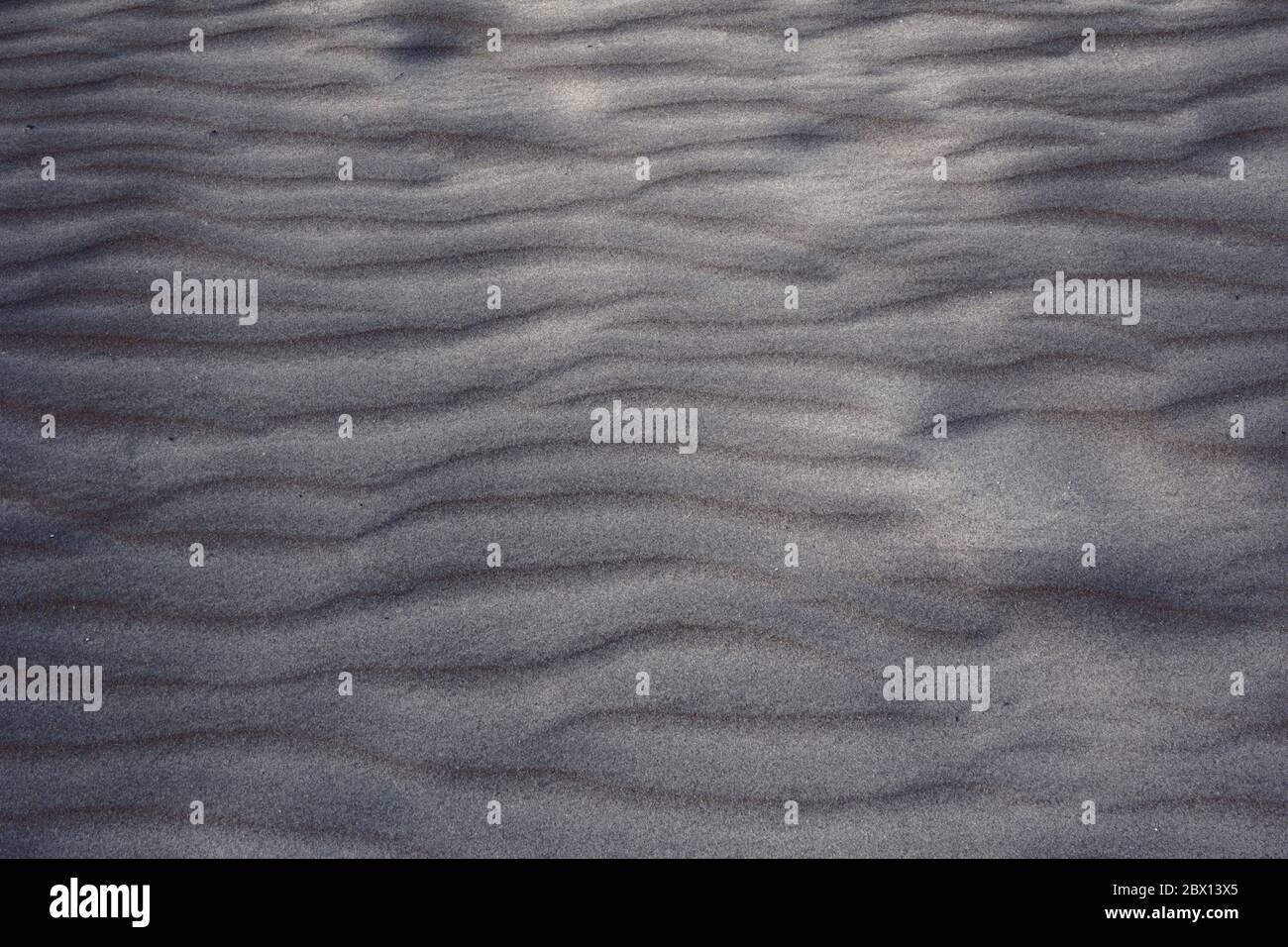 Strand Sand Textur und Muster Hintergrund Stockfoto